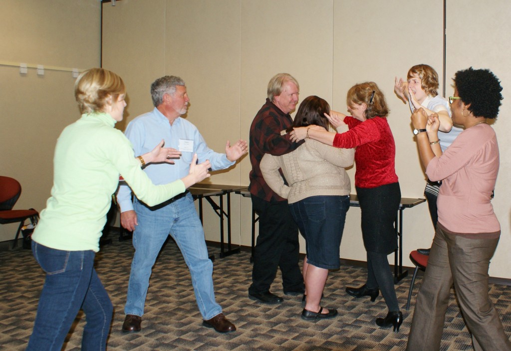 Photograph of people acting out a skit